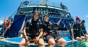 Divers on boat preparing